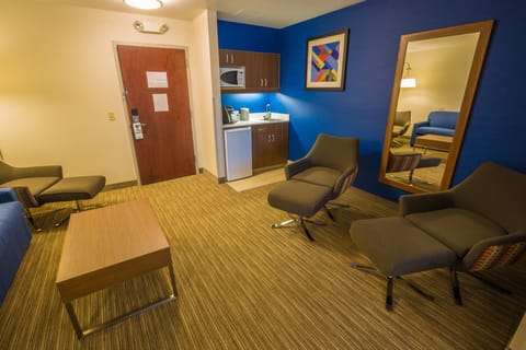 Suite, 1 King Bed | In-room safe, desk, iron/ironing board, free cribs/infant beds