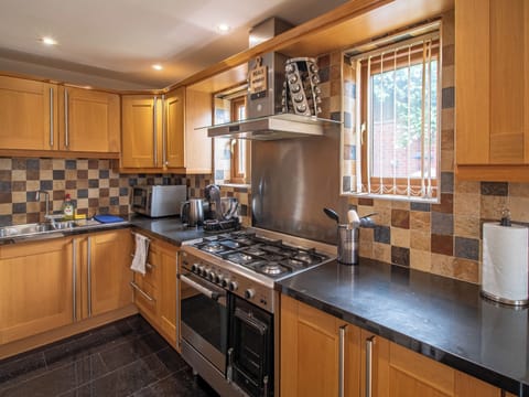 Villa | Private kitchen | Fridge, microwave, oven, stovetop