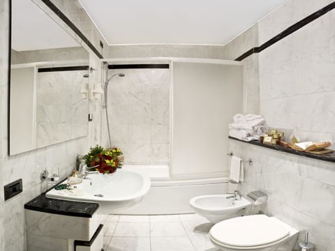 Separate tub and shower, jetted tub, free toiletries, hair dryer