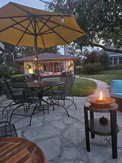 Patio next to the water with plenty of seating