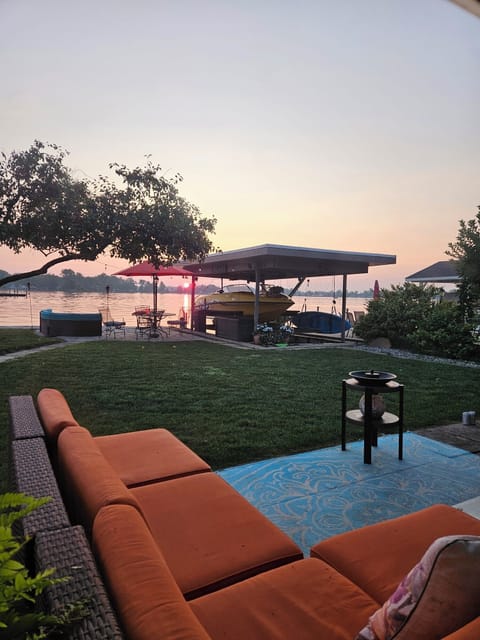 Patio next to the house with plenty of seating