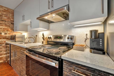 Kitchen: A fully equipped kitchen with sleek, modern appliances for all your cooking needs.