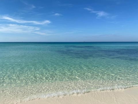 On the beach, white sand