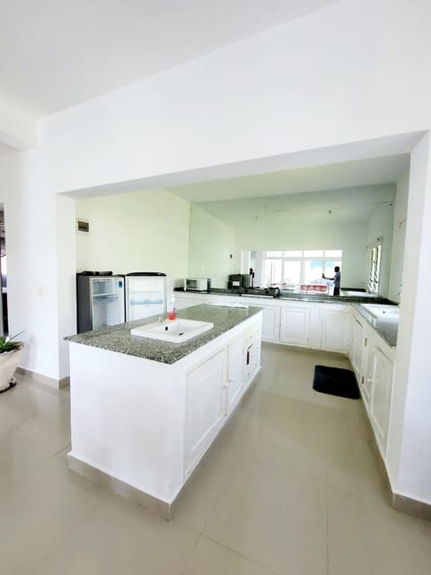 Luxury Apartment, Pool View | Private kitchen | Fridge, microwave, oven, stovetop