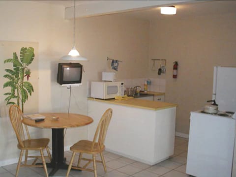 Apartment, 1 Bedroom | Private kitchen | Fridge, microwave, stovetop, coffee/tea maker