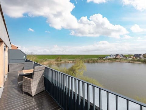 Sky, Shade, Land Lot, Cottage, Siding, Facade, Residential Area, Landscape, Roof, Grass