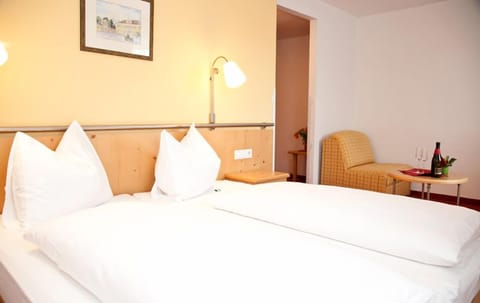 Hypo-allergenic bedding, desk, laptop workspace, iron/ironing board