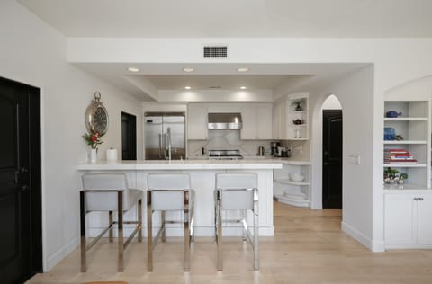 Kitchen bar counter with seating for 3