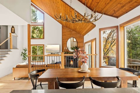 Gather for meals together at the dining table, with seating for the whole family