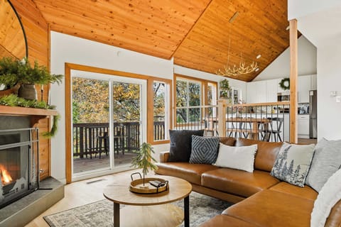 Cozy up by the living room fireplace and stream your favorites!