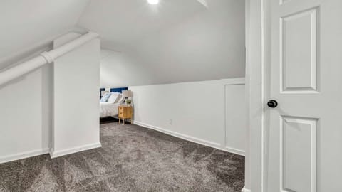 A spacious room designed for comfort and relaxation, offering plenty of room to move around and unwind. Whether you're lounging, reading, or just enjoying the space, it’s the perfect environment to feel at home.