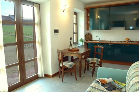 Apartment, 1 Bedroom, Garden View | Living area | 32-inch TV with digital channels