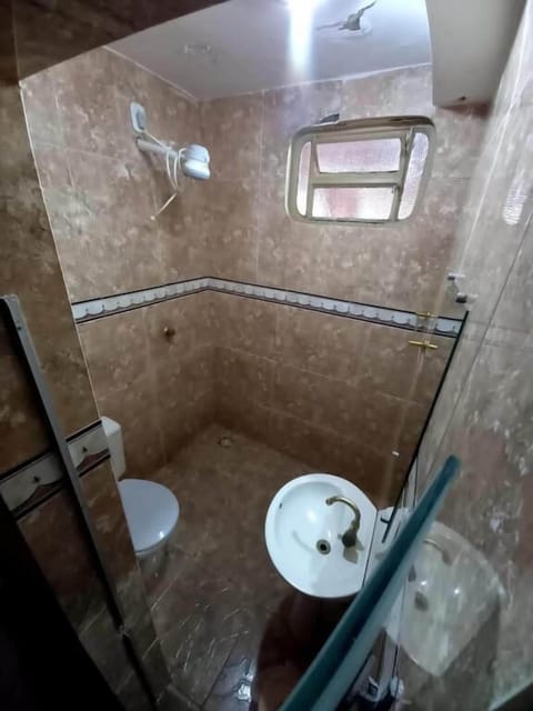 Double Room | Bathroom | Shower, rainfall showerhead, soap, toilet paper