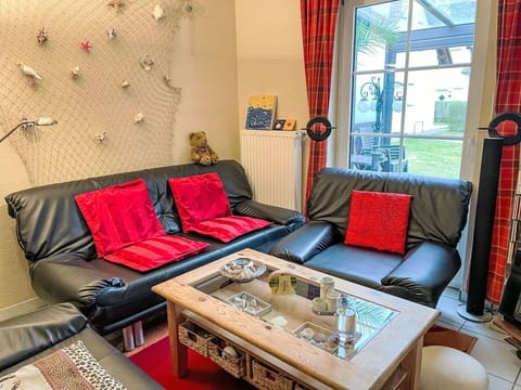 Furniture, Interior Design, Flooring, Couch, Floor, Living Room, Lighting, Room, Table, Chair