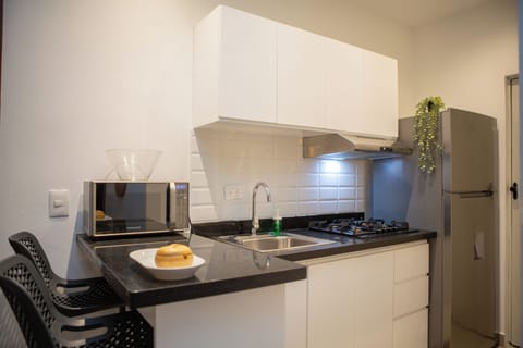 Standard Apartment | Private kitchen | Fridge, oven, stovetop, cookware/dishes/utensils