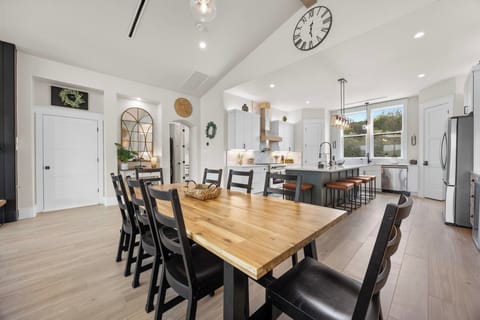 Dining table for 8 and seating for 5 at the countertop