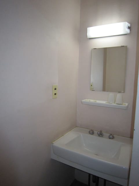 Separate tub and shower, free toiletries, hair dryer, slippers