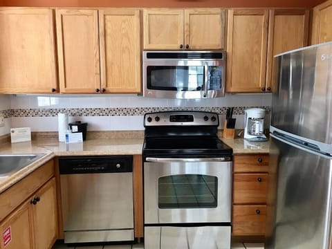 2G Cuban Club Premium 1 Bedroom Condo, 2 Queen Beds, 1.5 Baths,  Annex Building, 2nd Floor | Private kitchen | Microwave, coffee/tea maker, freezer, paper towels