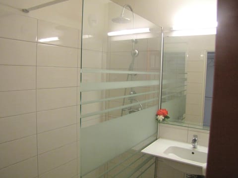 Family Apartment, 1 Bedroom, Kitchen, Park View | Bathroom | Shower, rainfall showerhead, free toiletries, hair dryer