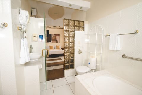 Superior Room | Bathroom | Hair dryer, soap, shampoo, toilet paper