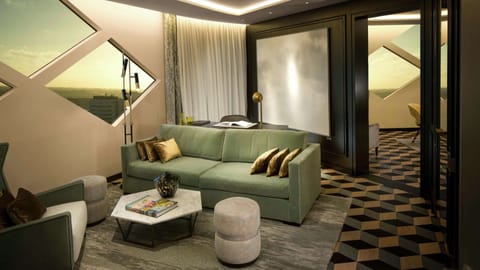 Suite, Business Lounge Access (Diamond) | Living area | TV, toys