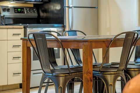 Kitchen Suite, 3 Queen Beds | Private kitchen | Fridge, microwave, coffee/tea maker