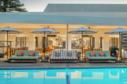 Outdoor pool, open 8:00 AM to 10:00 PM, cabanas (surcharge)