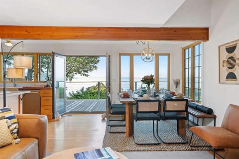 Open commons areas with large windows and double patio doors feel like you're apart of the Puget