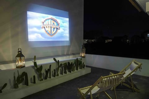 Outdoor cinema theater with ultra HD projector