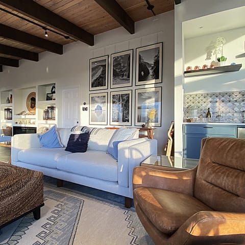 Ocean View Lounge | Oregon photo art prints provide backdrop.