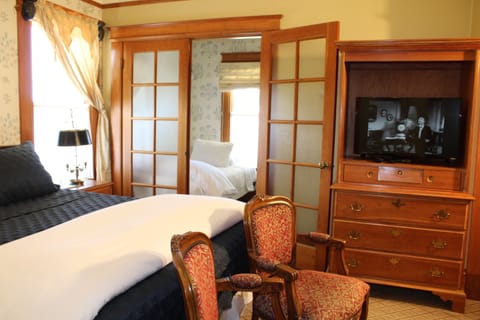 Premium Room, Multiple Beds | Premium bedding, iron/ironing board, free WiFi, bed sheets