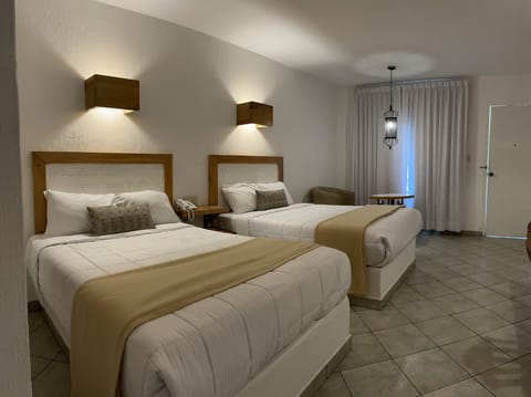 Deluxe Double Room, 2 Double Beds | Free WiFi, bed sheets