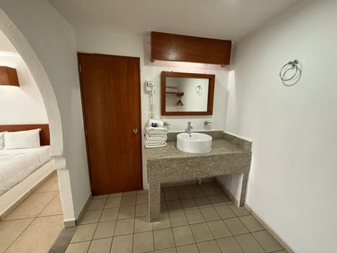 Junior Suite, 2 Double Beds | Bathroom | Shower, rainfall showerhead, free toiletries, towels