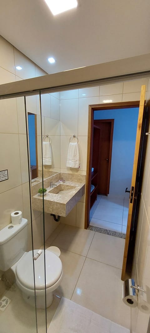 Triple Room | Bathroom | Shower, hair dryer, towels, soap