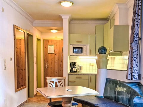 Interior Design, Furniture, Flooring, Wood, Floor, Ceiling, Room, Lighting, Apartment, Chair