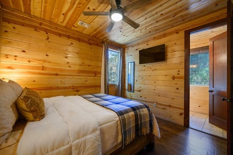  [Second Level: Bedroom 6] Queen bed. Smart TV to the left of this photo