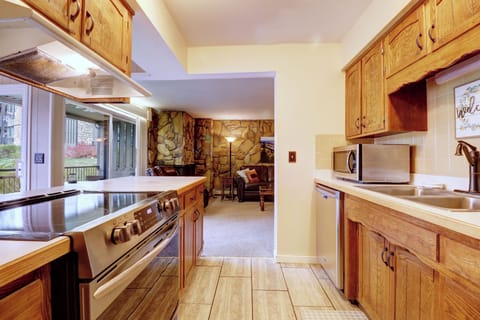 Kitchen features nicely updated stainless steel appliances.