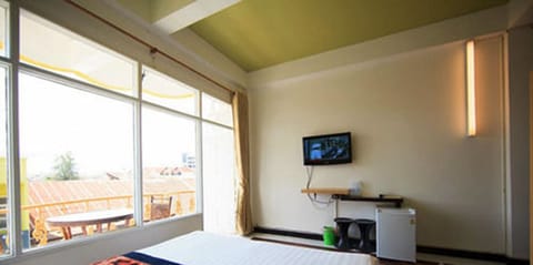 Deluxe Room, Balcony, City View | Desk, free WiFi