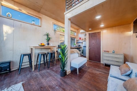 The living room, kitchen table and kitchenette area.