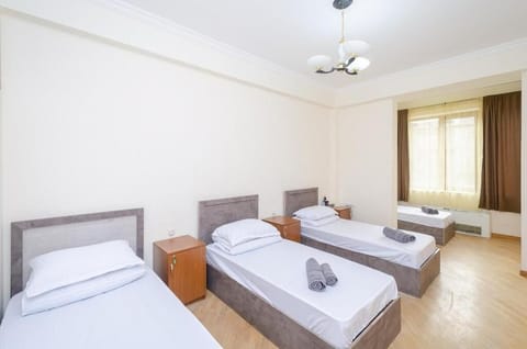 Standard Quadruple Room, Mixed Dorm | Blackout drapes, iron/ironing board, free WiFi