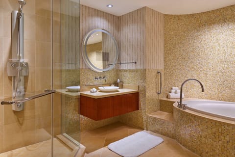 Separate tub and shower, designer toiletries, hair dryer, towels