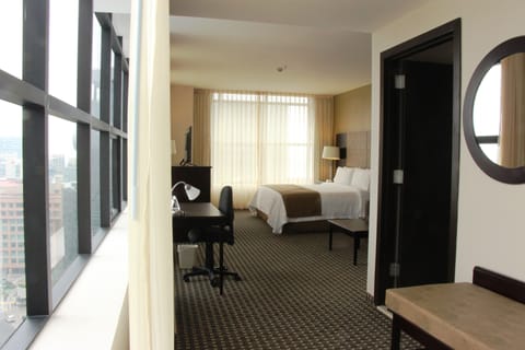 Suite, 1 King Bed | In-room safe, desk, soundproofing, iron/ironing board