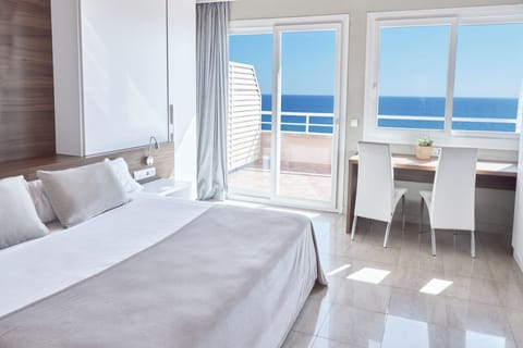 Junior Suite, 2 Bedrooms, Sea View | In-room safe, blackout drapes, iron/ironing board, bed sheets