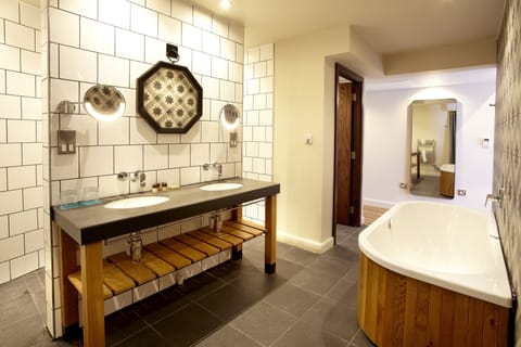 Premium Room, 1 King Bed (Bath and Shower) | Bathroom | Designer toiletries, hair dryer, bathrobes, slippers