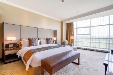 Suite, 1 King Bed (Prestige) | 1 bedroom, premium bedding, down comforters, minibar