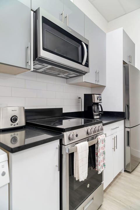 Comfort Apartment | Private kitchen | Fridge, microwave, stovetop, dishwasher