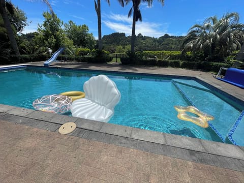 4x15m sparkling pool with lush garden