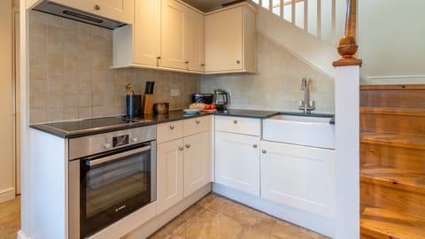 Whip up dinner in the ground floor kitchen