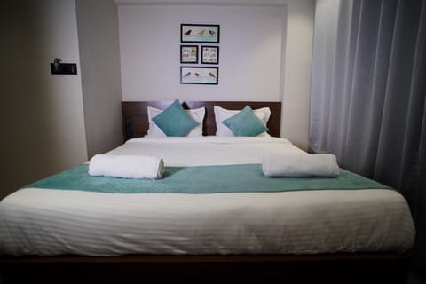 Standard Room, 1 Queen Bed, Non Smoking, City View | Free WiFi, bed sheets