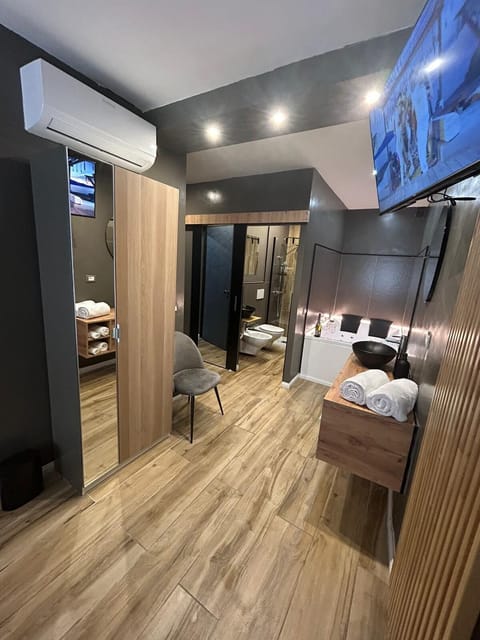 Double Room, City View | Blackout drapes, iron/ironing board, free WiFi